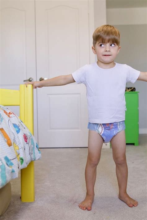 Tags can be irritating to a toddler's sensitive skin, so you may have more luck keeping him dressed if you remove them in advance. . My 10 year old wants to wear diapers
